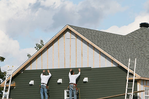 Professional Siding Replacement technician working in Salem, MA